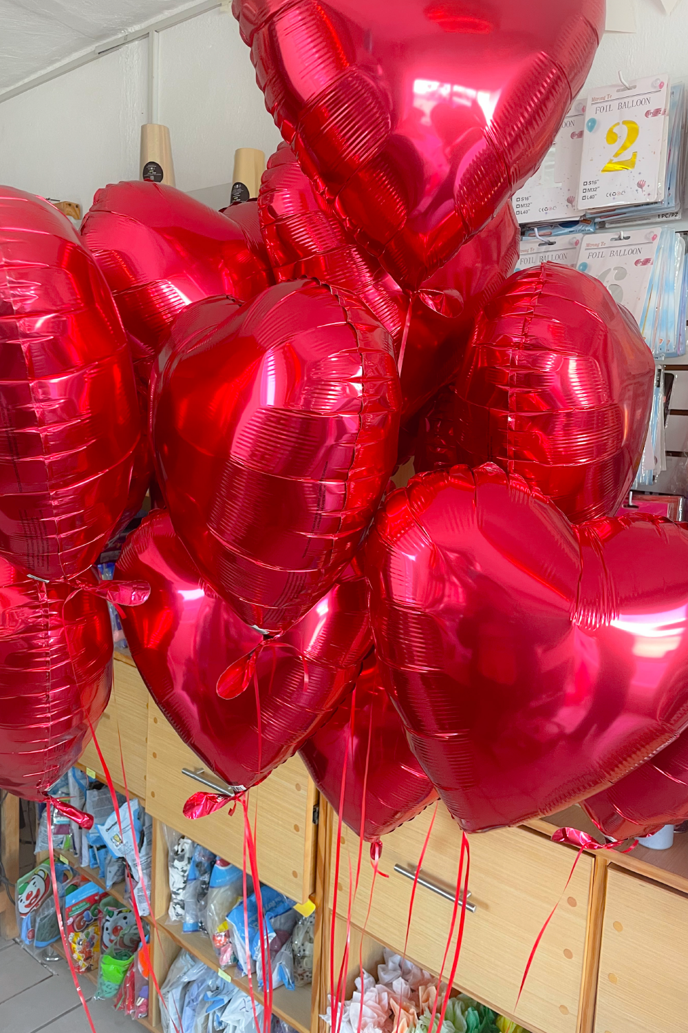 BOUQUET DE 12 GLOBOS DE CORAZÓN